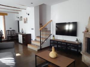 TV a/nebo společenská místnost v ubytování LAGAR DEL PALOMAR