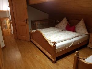 Ein Bett oder Betten in einem Zimmer der Unterkunft Beim Melchern