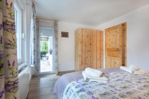 Postel nebo postele na pokoji v ubytování Honey apartments