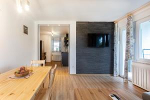 TV a/nebo společenská místnost v ubytování Honey apartments