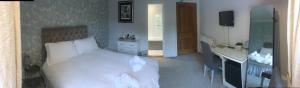 Letto o letti in una camera di The Colintraive