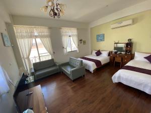 小城堡民宿Little Castle hotel 19窩窩近東大門夜市好停車房間的床