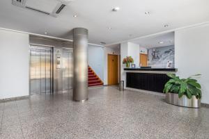 Kuchyň nebo kuchyňský kout v ubytování Stay Hotel Leiria Centro