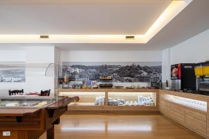 Kuchyň nebo kuchyňský kout v ubytování Stay Hotel Leiria Centro