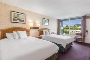 Ένα ή περισσότερα κρεβάτια σε δωμάτιο στο Americas Best Value Inn Wytheville