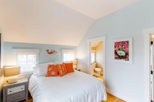 Ένα ή περισσότερα κρεβάτια σε δωμάτιο στο Mermaids Grotto