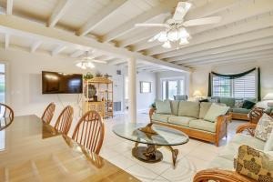 a living room with a couch and a table at Casa de Rosa in Key Colony Beach