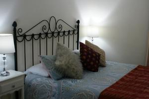 Posteľ alebo postele v izbe v ubytovaní Hotel Rural Molino del Puente Ronda