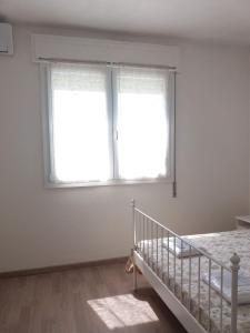 Posteľ alebo postele v izbe v ubytovaní Agriturismo Corte Filippi
