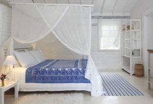 Postel nebo postele na pokoji v ubytování Pousada Capim Santo