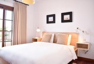 Postel nebo postele na pokoji v ubytování CASA BOUTIQUE LANZAROTE