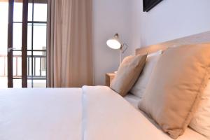 Postel nebo postele na pokoji v ubytování CASA BOUTIQUE LANZAROTE