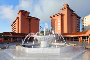
a large fountain in the middle of a building at Perdido Beach Resort in Orange Beach

