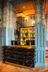 a wine bar with a large stack of wine bottles at The Clarence in Dublin