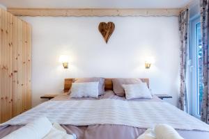 Postel nebo postele na pokoji v ubytování Honey apartments