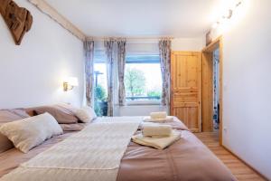 Postel nebo postele na pokoji v ubytování Honey apartments