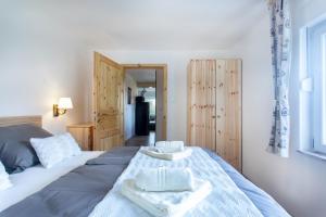 Postel nebo postele na pokoji v ubytování Honey apartments