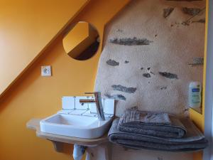Koupelna v ubytování Le Fiege gîte cosy et confort + 20 fotografií