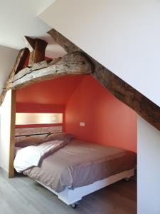 Postel nebo postele na pokoji v ubytování Le Fiege gîte cosy et confort