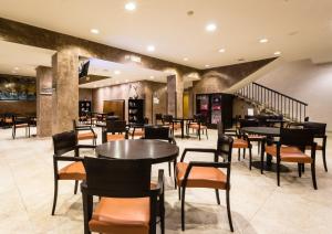 
A restaurant or other place to eat at Crowne Plaza Milan Malpensa Airport, an IHG Hotel
