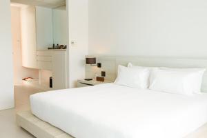 Postel nebo postele na pokoji v ubytování Centara Q Resort Rayong