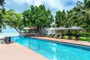 Bazén v ubytování Centara Q Resort Rayong nebo v jeho okolí