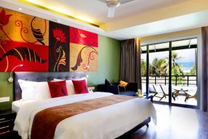 Ліжко або ліжка в номері Centara Ceysands Resort & Spa Sri Lanka