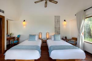 Postel nebo postele na pokoji v ubytování Centara Villas Samui - SHA Plus