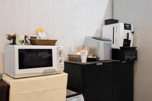 Kuchyň nebo kuchyňský kout v ubytování Tabist Hotel Mercury Asakusabashi