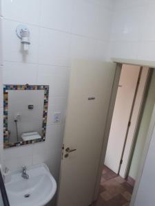 Koupelna v ubytování Apartamento na enseada 50 metros da praia