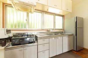 Köök või kööginurk majutusasutuses Villa Itona