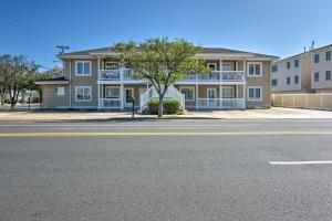 a large apartment building on the side of the street at Beach Block Wildwood Condo - Proximity to Dining! in Wildwood