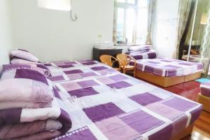 תמונה מהגלריה של Xiangyang Tianyuan Ju Homestay בDongshan