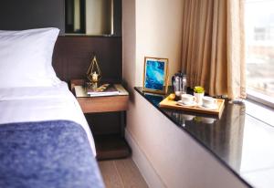 Katil atau katil-katil dalam bilik di Harbour Plaza 8 Degrees