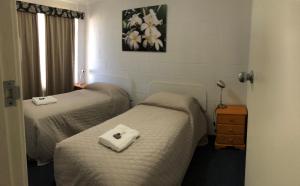 Postel nebo postele na pokoji v ubytování Carnarvon Gateway Motel