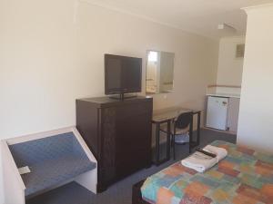 Kuchyň nebo kuchyňský kout v ubytování Carnarvon Gateway Motel