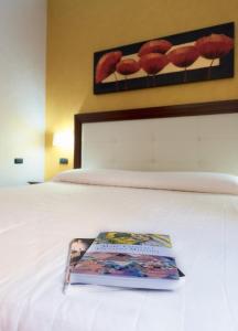 Voodi või voodid majutusasutuse Hotel Flora toas