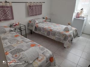 Postel nebo postele na pokoji v ubytování I colori di Iglesias