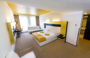 Postel nebo postele na pokoji v ubytování Grandior Hotel Prague