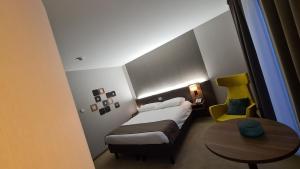 Postel nebo postele na pokoji v ubytování Hotel Drie Eiken + 16 fotografií