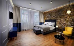 Posteľ alebo postele v izbe v ubytovaní Kalix Boutique Hotel + 22 fotografií