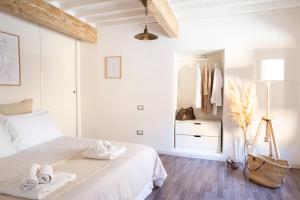 Posteľ alebo postele v izbe v ubytovaní ORANGE Tuscany Flat