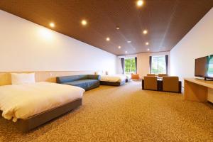 Letto o letti in una camera di Ooedo Onsen Monogatari Hotel Suiyotei