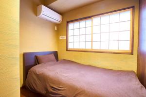 Ένα ή περισσότερα κρεβάτια σε δωμάτιο στο Ems-an