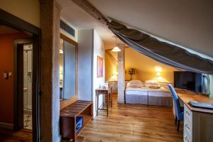 Postel nebo postele na pokoji v ubytování Boutique Hotel Nautilus
