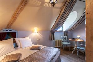Postel nebo postele na pokoji v ubytování Boutique Hotel Nautilus