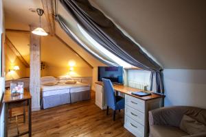 Postel nebo postele na pokoji v ubytování Boutique Hotel Nautilus