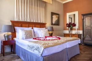 Postel nebo postele na pokoji v ubytování Boutique Hotel Nautilus