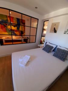 Posteľ alebo postele v izbe v ubytovaní Apartamento Aljarafe