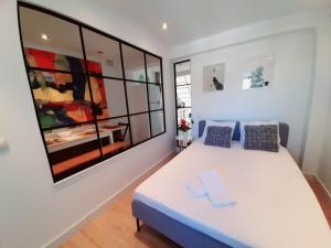 Posteľ alebo postele v izbe v ubytovaní Apartamento Aljarafe